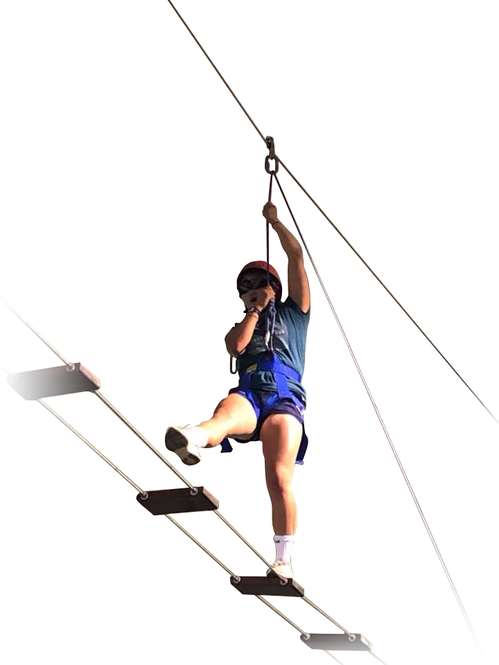 Teen girl on rope course